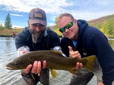 Jeremy Allan and a happy customer with a big Provo River brown trout