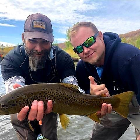 Jeremy Allan and a happy customer with a big Provo River brown trout
