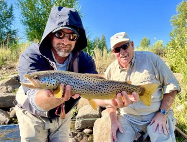 Jeremy Allan and a happy client with a great Provo River brown trout.