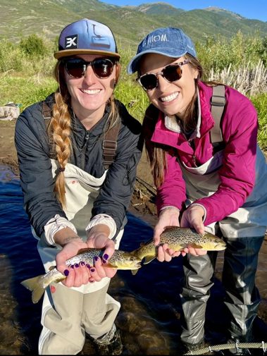 Two ladies with Provo River brown trout.