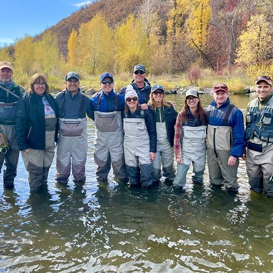 The Chevron group on a guided fly fishing trip.