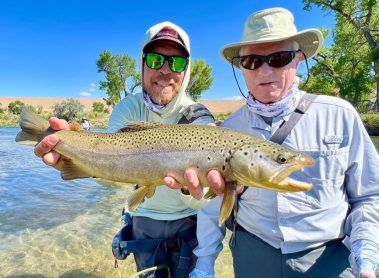 Guide Jake Smith with a happy client