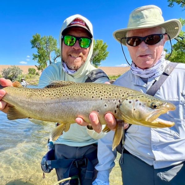 Guide Jake Smith with a happy client