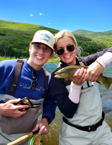 A Jeremy Allan Fly Fishing customer with a big brown trout