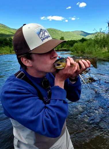 A Jeremy Allan Fly Fishing customer with a big brown trout