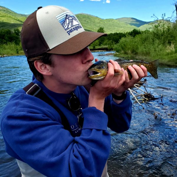 A Jeremy Allan Fly Fishing customer with a big brown trout