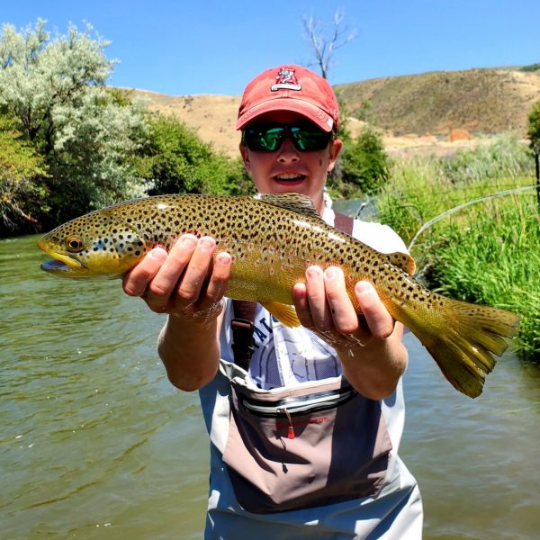 A Jeremy Allan Fly Fishing customer with a big brown trout
