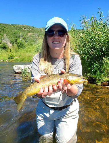 A Jeremy Allan Fly Fishing customer with a big brown trout