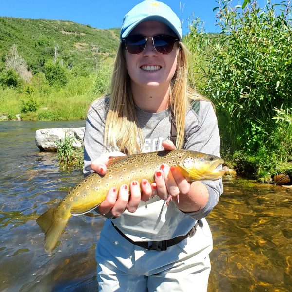 A Jeremy Allan Fly Fishing customer with a big brown trout