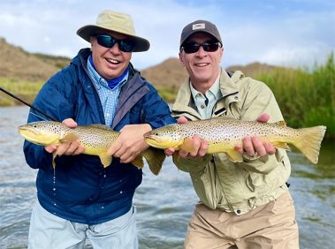 Jeremy Allan customers with two big brown trout