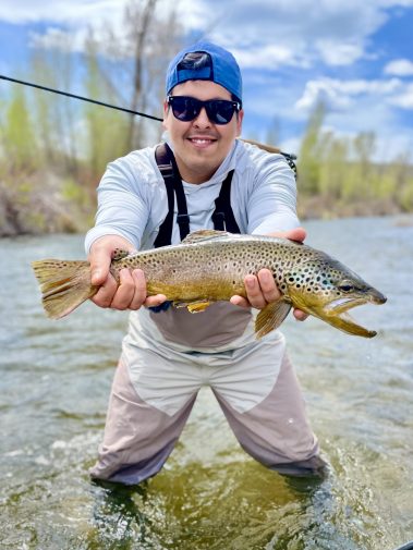 A Jeremy Allan Fly Fishing customer with a big brown trout