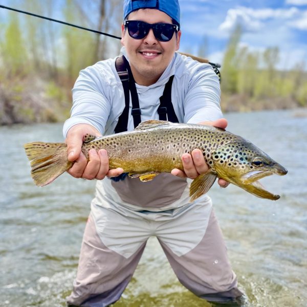 A Jeremy Allan Fly Fishing customer with a big brown trout