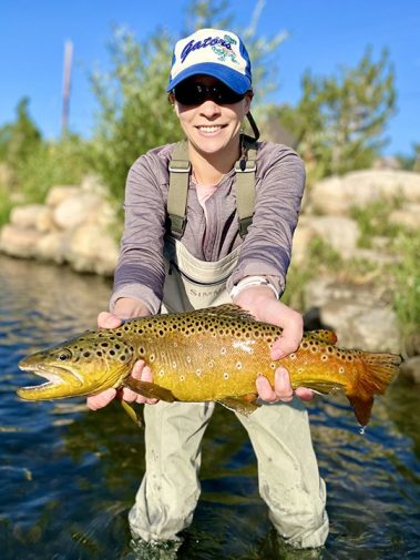 A Jeremy Allan Fly Fishing customer with a big brown trout