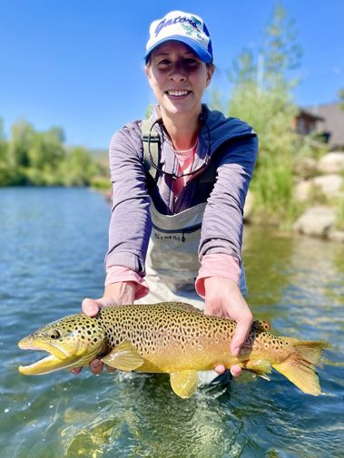 A Jeremy Allan Fly Fishing customer with a big brown trout