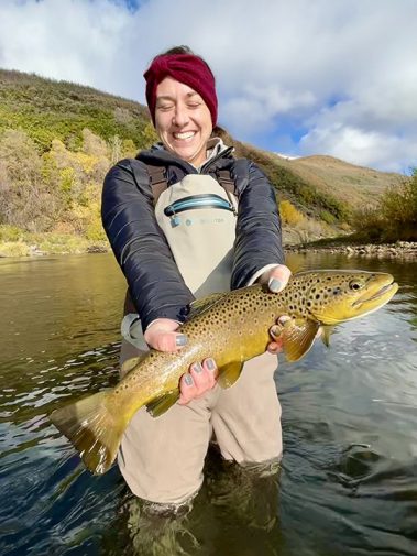 A Jeremy Allan Fly Fishing customer with a big brown trout