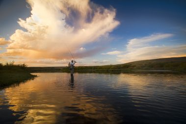 Dry fly casting in Wyoming. Utah fly fishing photography by Jeremy Allan.