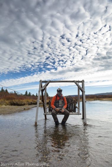 A fly fisherman takes it all in on the Madison