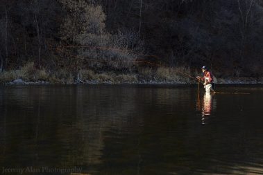 Fly Fisherman casting on the Provo River.