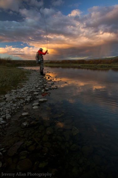 Wyoming Sunset and a fly fisherman