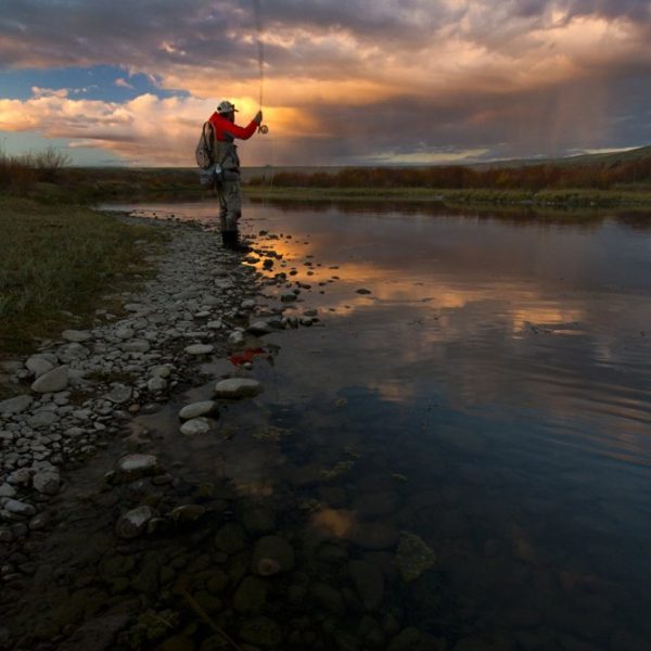 Wyoming Sunset and a fly fisherman